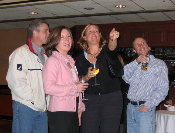 Enjoying the slide show: Mike Luchetti, Tracey Kane, Holly Tompkins, John Doyle